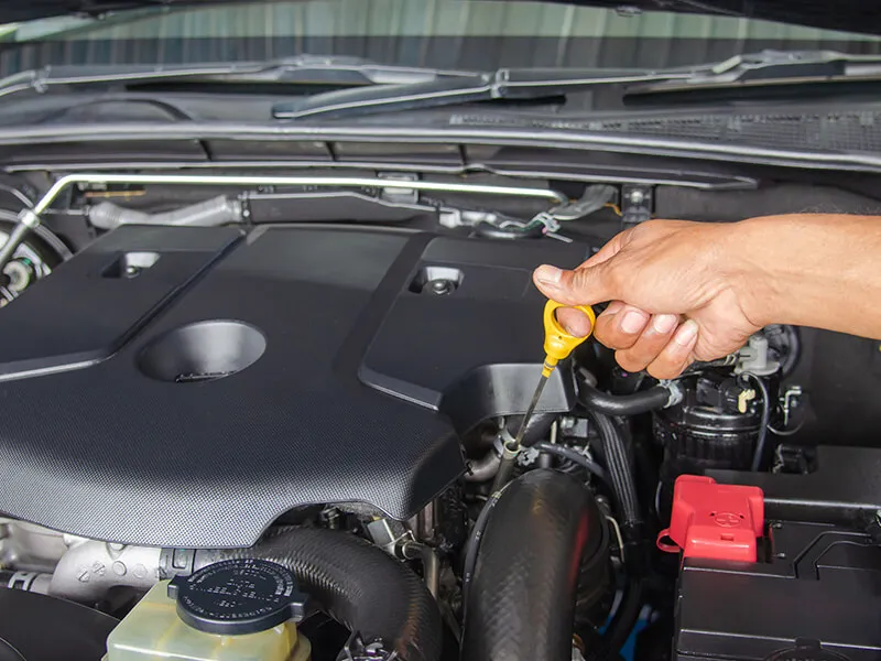 Checking engine oil level in a BMW after an oil change