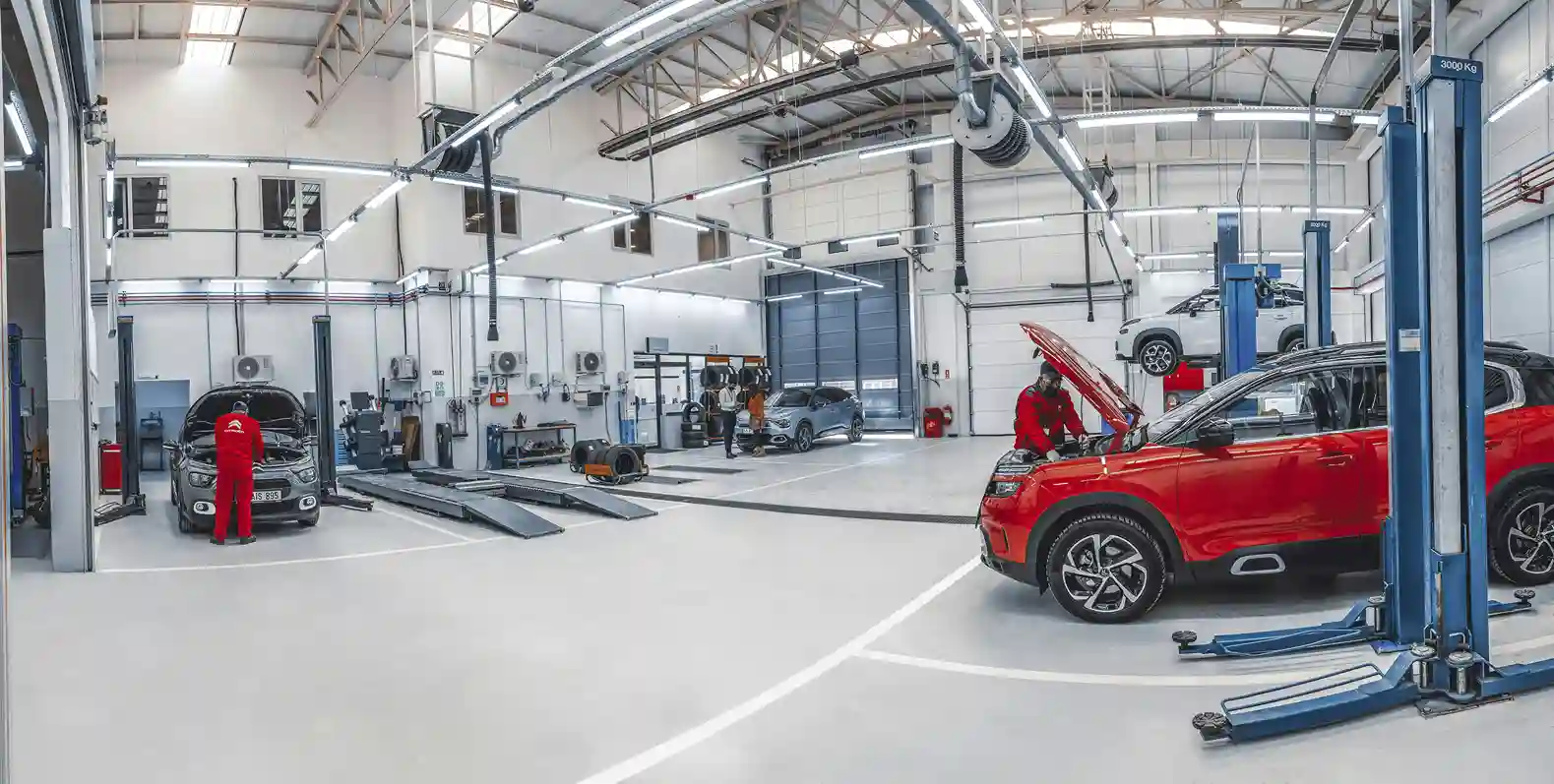 European vehicle inside a professional automotive repair workshop